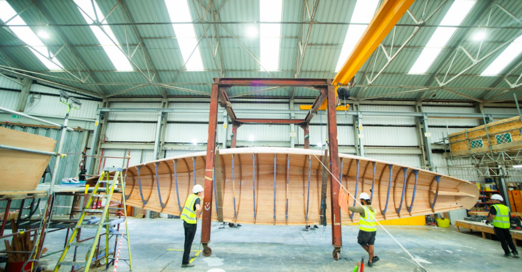 wide view Spirit Yachts Q Falcon Project boat in shed