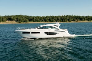 large white flybridge motorboat