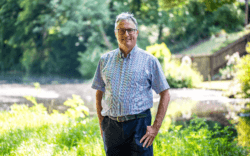 Canal & River Trust CEO Richard Parry stands near a canal.