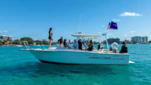 E-Force Marine's electric propulsion boat in water with a lot of people onboard