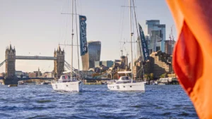 Two Oyster sailing yachts on the River Thames with Tower Bridge backdrop