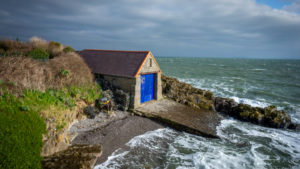 a lifeboat station on cliffside with blue door. This was once manned by cannibal Thomas Lewis