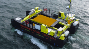 Uncrewed surface vessel - yellow - on water