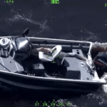 aerial footage of small fishing sportsboat