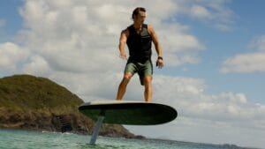 Man riding on Fliteboard foiling surfboard