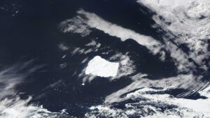 The world’s largest iceberg, known as A23a, center, ran aground off the coast of the island of South Georgia. Credit: NASA