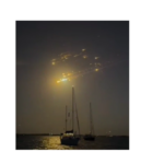 boaters watch as SpaceX explodes