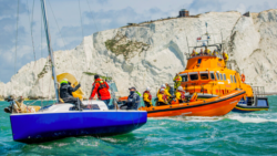 RNLI vessel and yacht off Isle of Wight