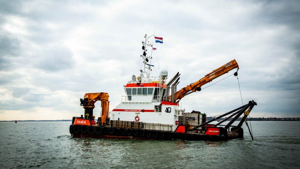Harwich Haven Authority testing Tiamat on back of dredger in water