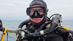 View of diver Dom Robinson as he prepares to visit Almond Branch wreck he bought from facebook for £300