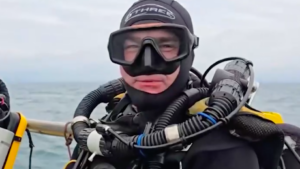 View of diver Dom Robinson as he prepares to visit Almond Branch wreck he bought from facebook for £300