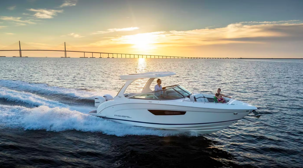 Boat with sunset in background used to illustrate OneWater Marine's website and financial results