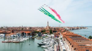 Planes fly over Venice Boat Show and leave smoke in their wake