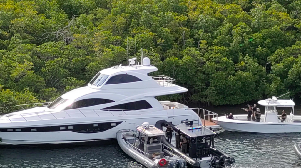 Yacht rammed on shore surrounded by police chasing Russian yacht thief