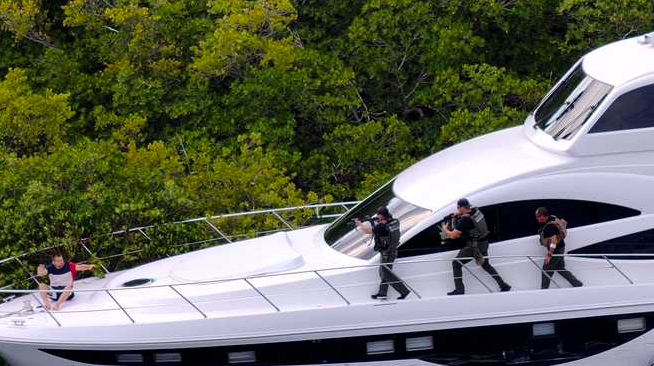 Police stalk yacht deck with guns to capture Russian yacht thief