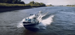Boat races along river with Hertz Marine Audio speakers blasting its soundtrack