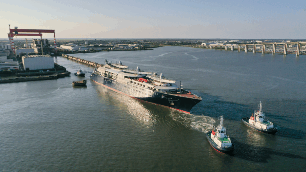 Orient Express Corinthian aerial view as yacht is towed out for next stage of build