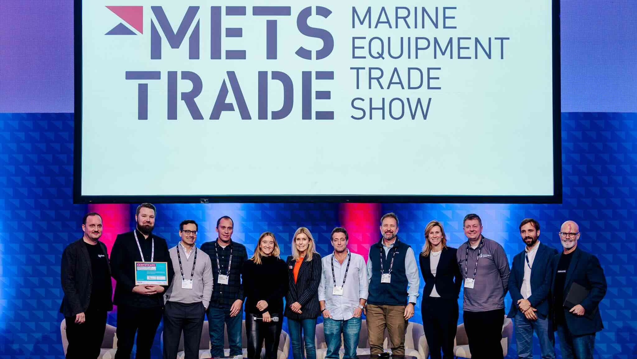Businessmen and women on stage at Metstrade