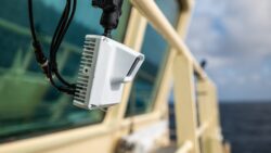 image of camera on side of boat for AI assisted plastic cleanup