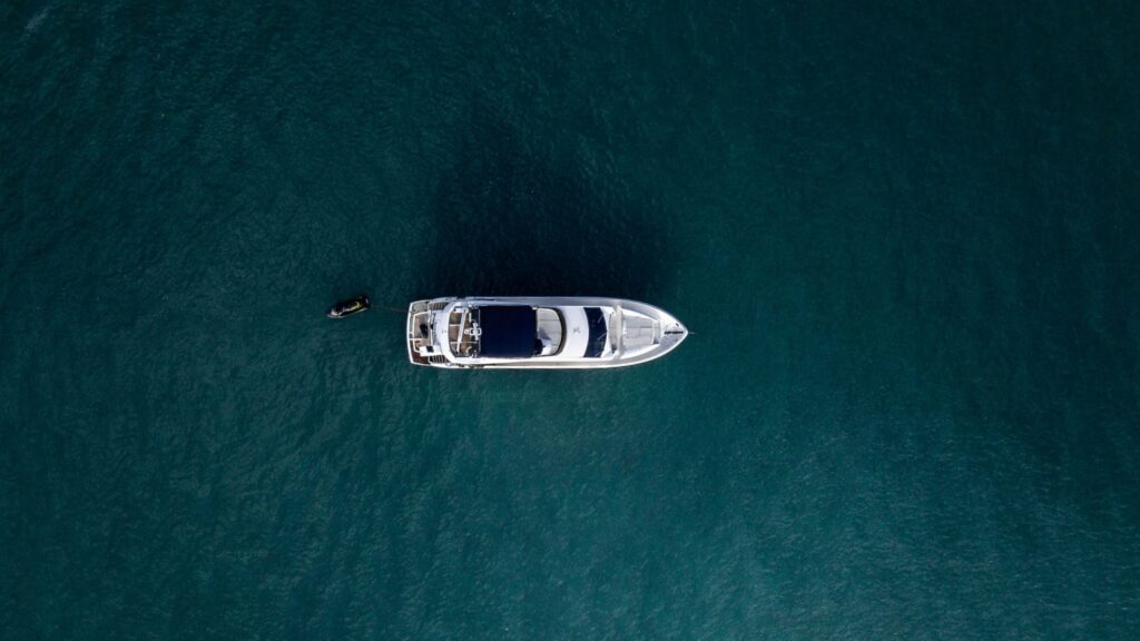 aerial view of white motor yacht
