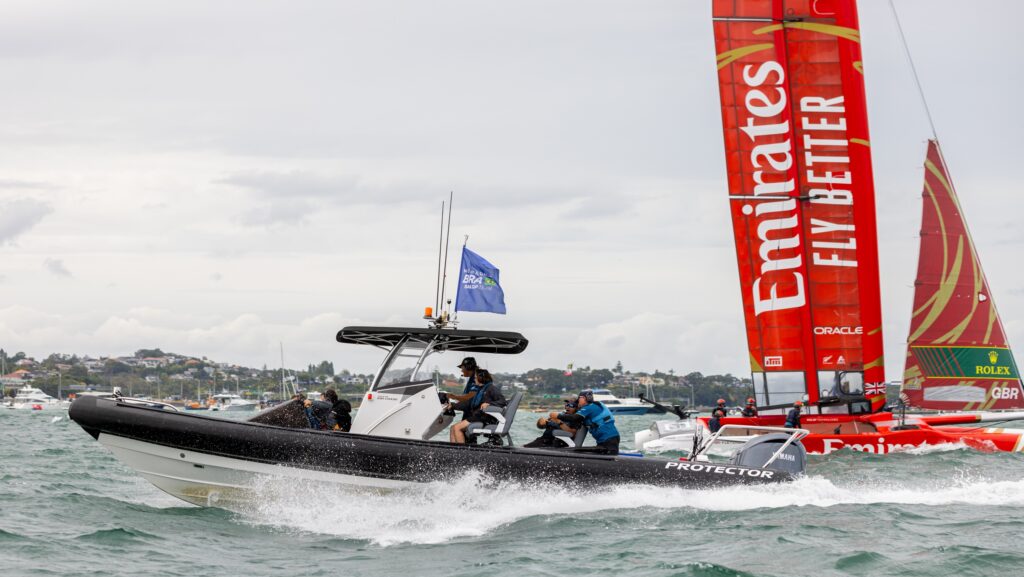 Protector RIB ploughs across sea by SailGP boat