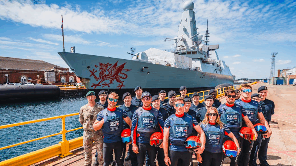 Emirates GBR race squad stand by the Royal Navy warship HMS Dragon in Portsmouth