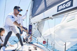 man on racing sail yacht