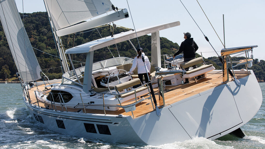 people sailing under on a hylas yachts H57 sailing boat