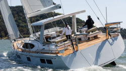 people sailing under on a hylas yachts H57 sailing boat