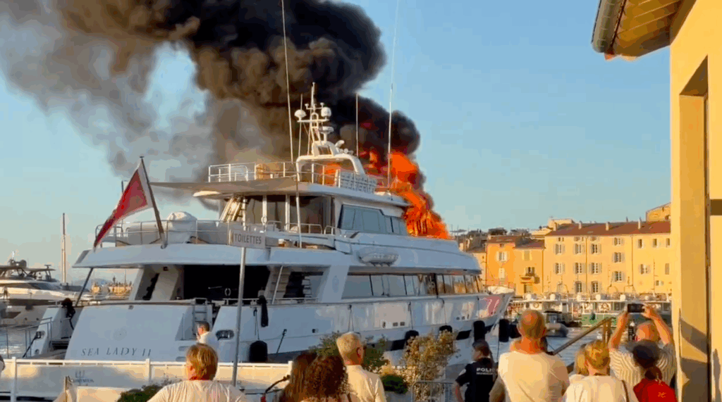 Superyacht burns - flames rip into sky as tourists look on in St Tropez