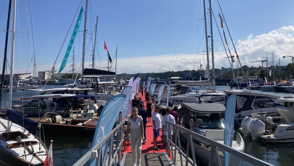View down Polboat pontoon with boats either side