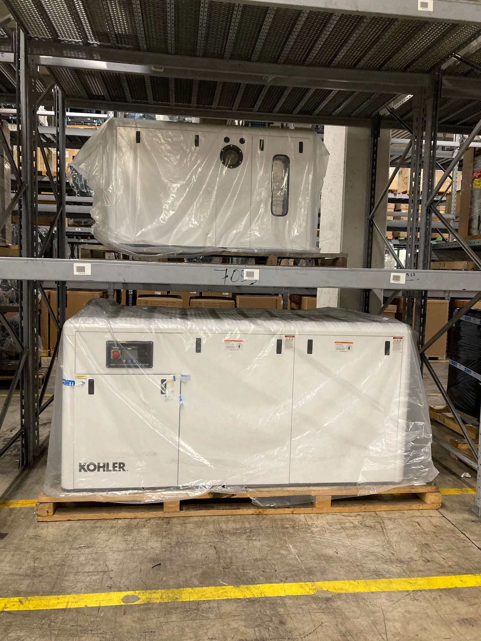 Kohler generators stacked in SAIM warehouse
