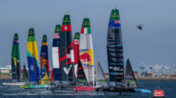 New Zealand SailGP Team helmed by Peter Burling lead over Red Bull Italy SailGP Team helmed by Ruggero Tita, Switzerland SailGP Team helmed by Sebastien Schneiter and the rest of the the SailGP feet on Race Day 1 of the Rolex Los Angeles Sail Grand Prix held in the Port of Los Angeles, California, USA. Saturday 15 March 2025. Rolex SailGP Championship Event 4 Season 2025. Photo: Jason Ludlow for SailGP. Handout image supplied by SailGP