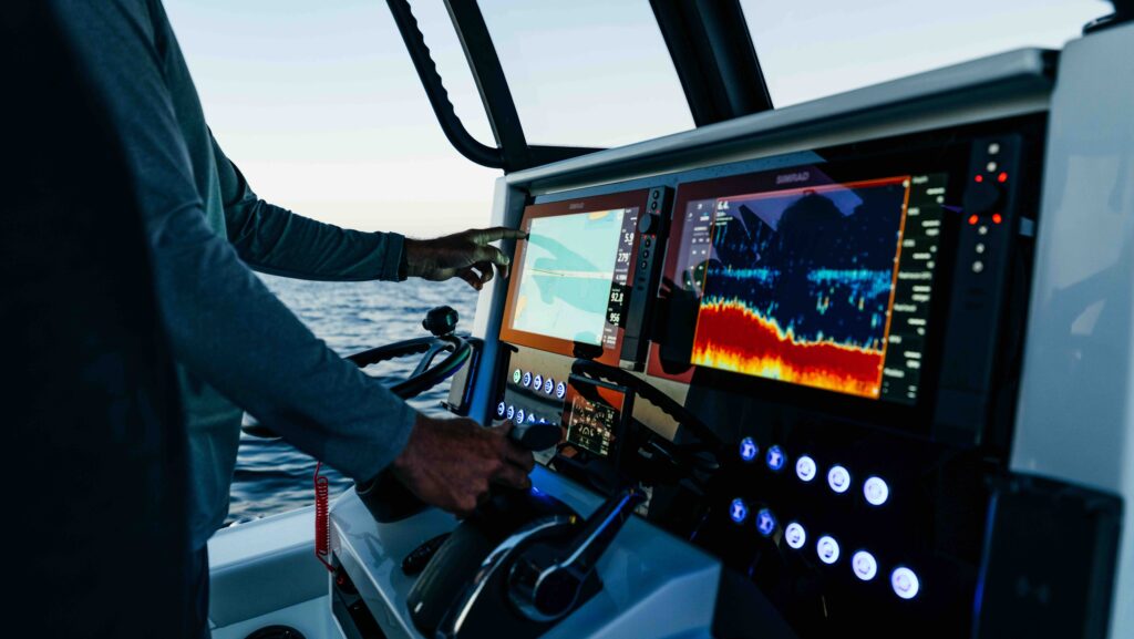 hands on boat's information console