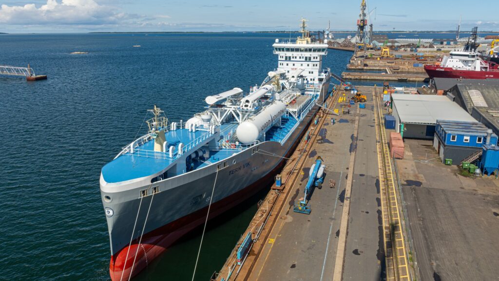 shipping container docked alongside