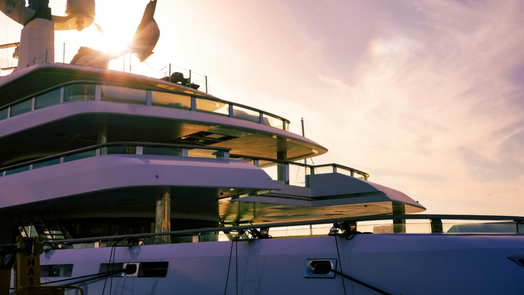 Front of superyacht at sunset