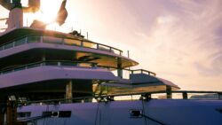 Front of superyacht at sunset