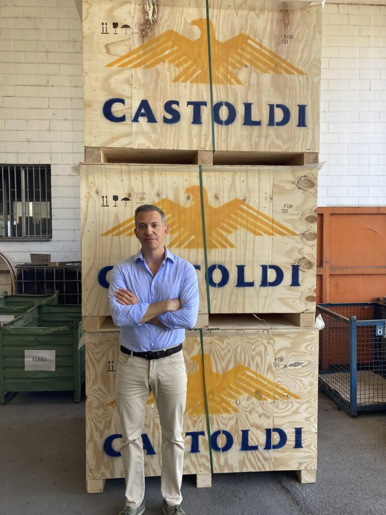 Giacomo Castoldi stands by boxes