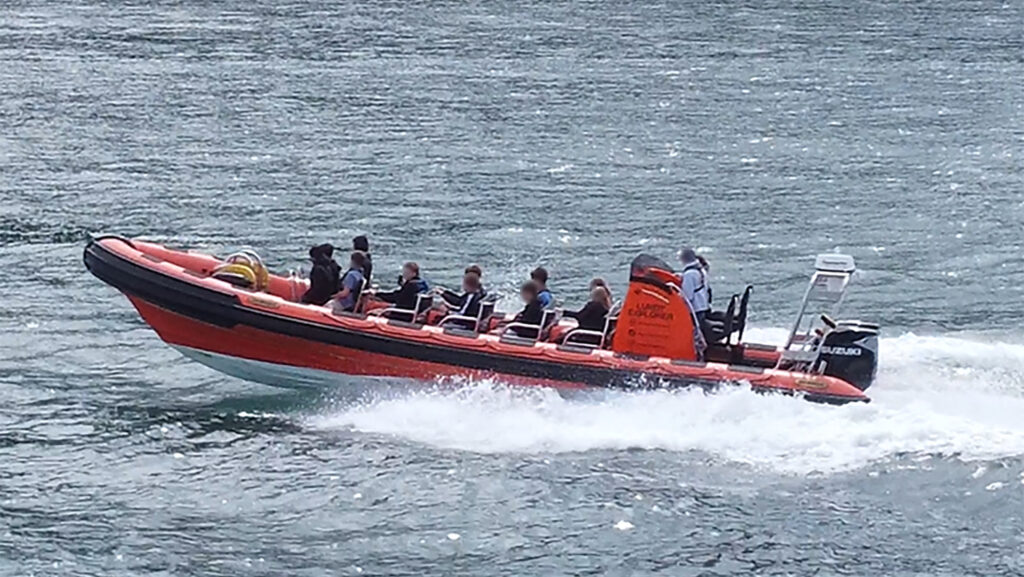 Lundy Explorer heads out to sea - RIB with passengers onboard in Ilfracombe Devon