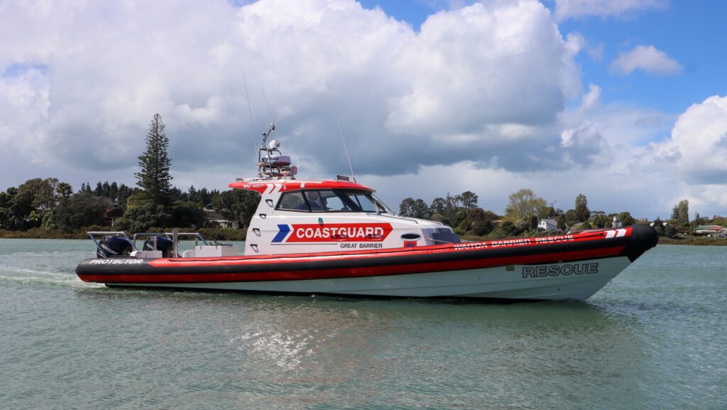 view of red and white NZ Customs Protector 410 Targa
