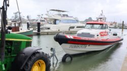 NZ Customs Protector 410 Targa being hauled out by tractor