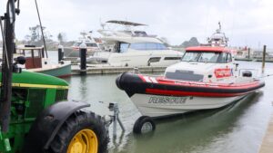 NZ Customs Protector 410 Targa being hauled out by tractor