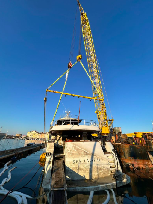 Filthy superyacht lifted from water in St Tropez. It's Sea Lady II which sank in July 2025 with full crane in background
