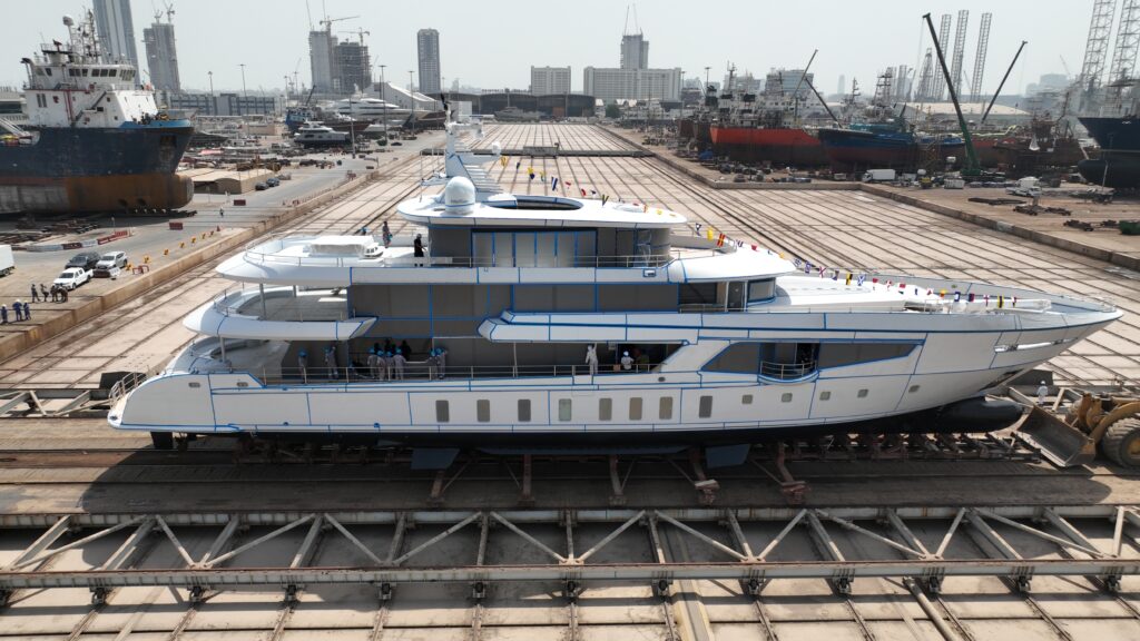 side view image of white 3-deck superyacht - Romeo 55
