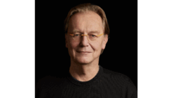 person wearing glasses and black t shirt