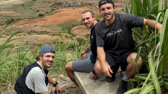 Maclean brothers on hillside before rowing adventure