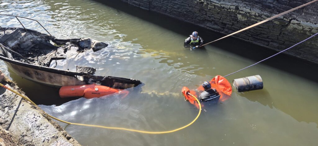 Image of recovery operation of boat explosion at Kelston Lock