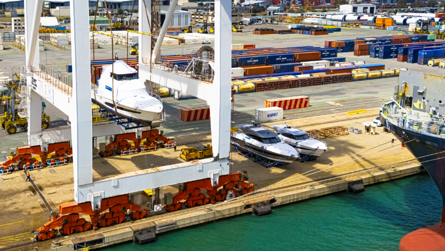 Riviera Marine export to FLIBS - aerial view of boats being loaded onto ship