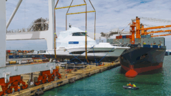 Riviera Marine export to FLIBS - boat in cradle being loaded onto ship