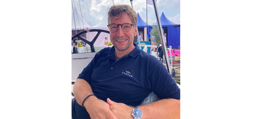 Stefan Zimmermann Zschocke Oyster CEO sat on a boat and smiling